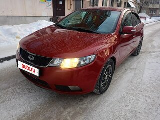 2010 Kia Cerato 6-speed II, красный, 600000 рублей, вид 2