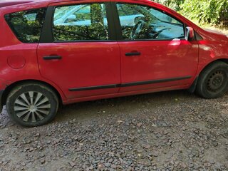 2009 Nissan Note I Рестайлинг, красный, 450008 рублей, вид 2