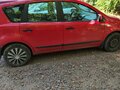 2009 Nissan Note I Рестайлинг, красный, 450008 рублей - вид 1