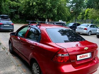 2010 Chevrolet Aveo I Рестайлинг, красный, 290000 рублей, вид 4
