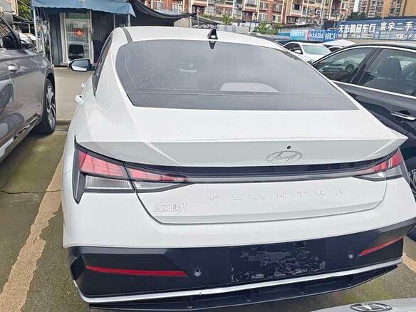 2023 Hyundai Elantra N Line VII (CN7) Рестайлинг, белый - вид 4