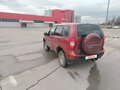 2011 Chevrolet Niva I Рестайлинг, красный, 400000 рублей - вид 5