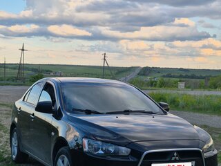 2011 Mitsubishi Lancer X Рестайлинг, чёрный, 740000 рублей, вид 1
