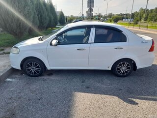 2011 Chevrolet Aveo I Рестайлинг, белый, 255000 рублей, вид 4