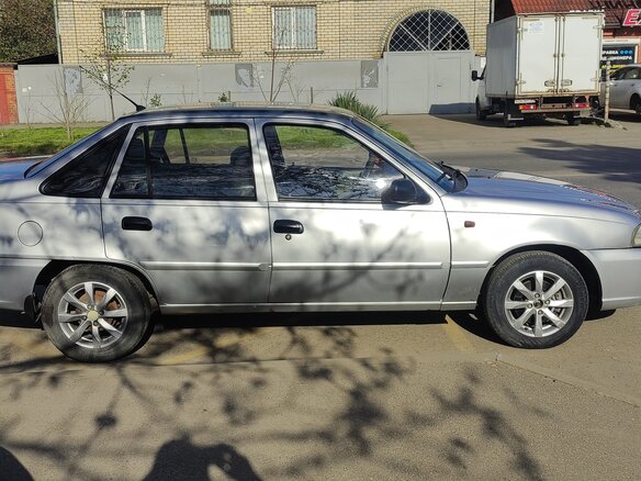 2011 Daewoo Nexia I Рестайлинг, серебристый, 260000 рублей - вид 3
