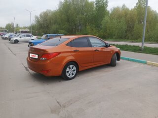 2014 Hyundai Solaris I Рестайлинг, оранжевый, 930000 рублей, вид 4