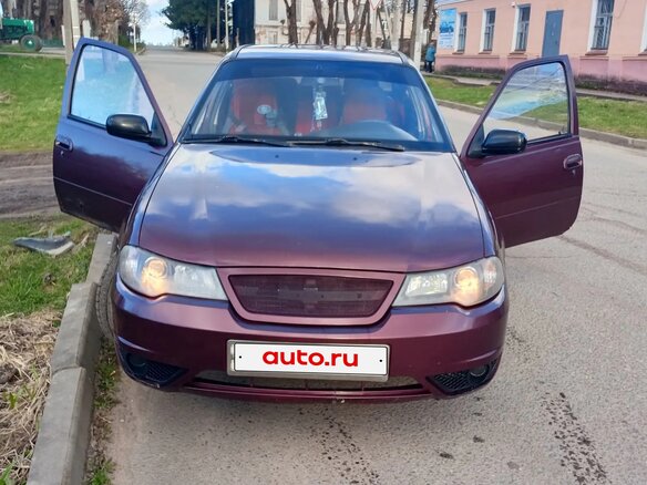 2009 Daewoo Nexia I Рестайлинг, пурпурный, 160000 рублей - вид 2