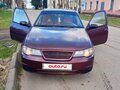2009 Daewoo Nexia I Рестайлинг, пурпурный, 160000 рублей - вид 2