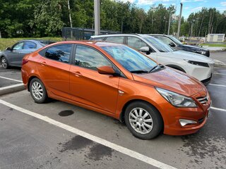 2014 Hyundai Solaris I Рестайлинг, оранжевый, 850000 рублей, вид 3