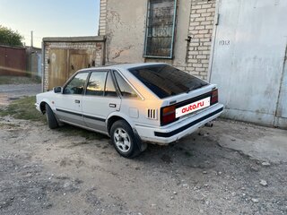 1986 Nissan Bluebird VIII (T12, T72), белый, 70000 рублей, вид 3