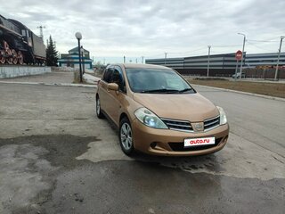 2010 Nissan Tiida I, золотистый, 850000 рублей, вид 1