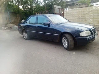 1998 Mercedes-Benz C-Класс 180 I (W202) Рестайлинг, синий, 350000 рублей, вид 3