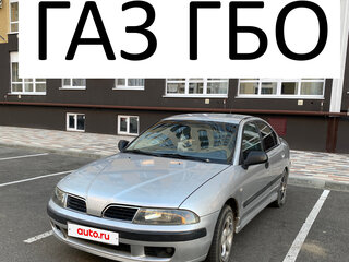2002 Mitsubishi Carisma I Рестайлинг, серебристый, 225000 рублей, вид 1