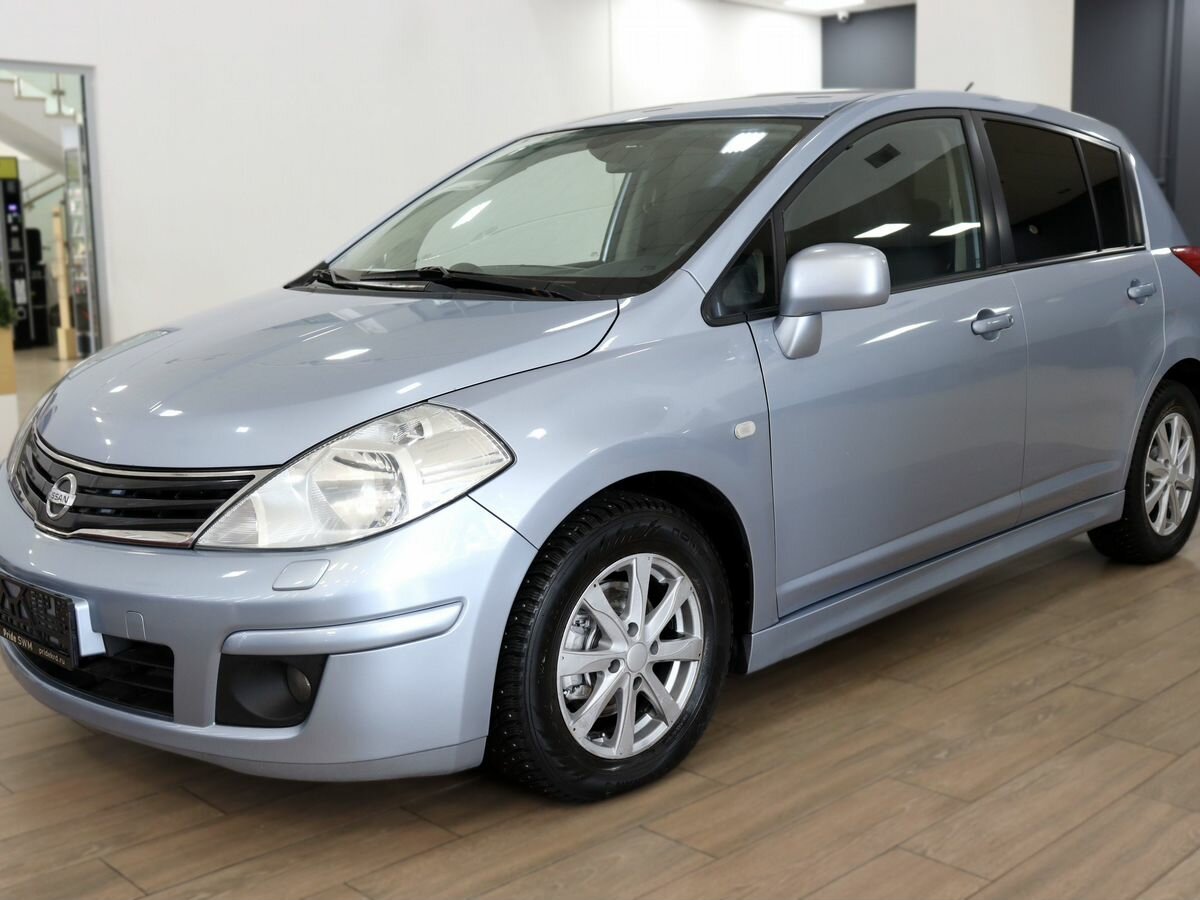 Открыть фотографии: Nissan Tiida I Рестайлинг