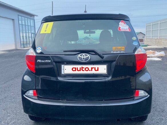 2011 Toyota Ractis II, чёрный, 915000 рублей - вид 4