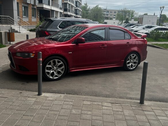 2008 Mitsubishi Lancer X, красный, 1050000 рублей - вид 2