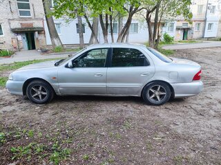 1999 Kia Clarus II, серый, 97000 рублей, вид 5