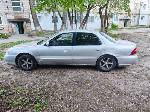1999 Kia Clarus II, серый, 97000 рублей - вид 4