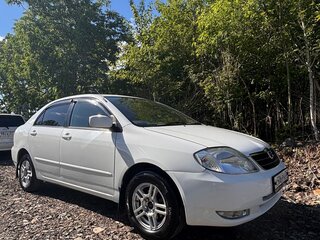 2002 Toyota Corolla IX (E120, E130), белый, 550000 рублей, вид 2