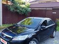 2008 Ford Focus II Рестайлинг, чёрный - вид 1