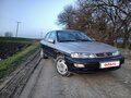 1998 Kia Sephia I Рестайлинг, коричневый, 200000 рублей - вид 1