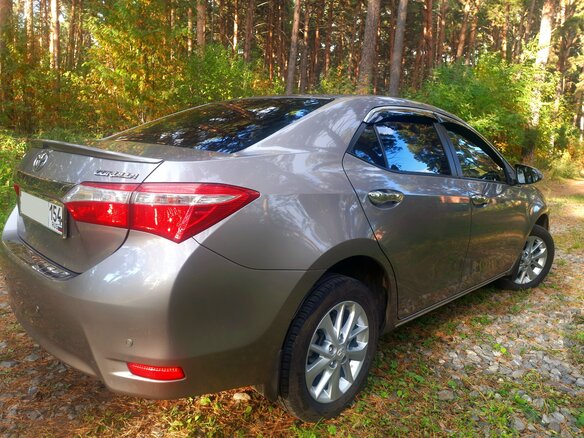 2014 Toyota Corolla XI (E160, E170, E180), золотистый, 1800000 рублей - вид 12