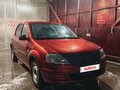 2011 Renault Logan I Рестайлинг, красный - вид 4