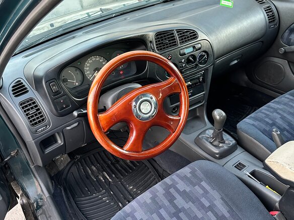 1997 Mitsubishi Lancer VII, зелёный - вид 15