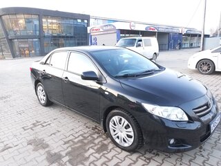 2009 Toyota Corolla X (E140, E150), чёрный, 970000 рублей, вид 4