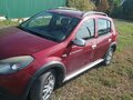 2012 Renault Sandero I, красный, 640000 рублей - вид 3