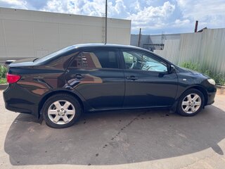 2009 Toyota Corolla X (E140, E150), чёрный, 670000 рублей, вид 3