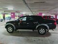 2007 Mitsubishi L200 IV, чёрный - вид 2