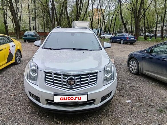 2014 Cadillac SRX II Рестайлинг, белый, 2000000 рублей - вид 1