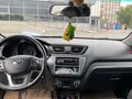 2014 Kia Rio 6-speed III, голубой, 517000 рублей - вид 7