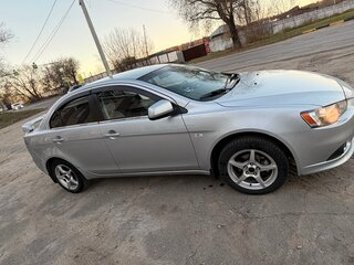 2011 Mitsubishi Lancer X Рестайлинг, серебристый, 600000 рублей, вид 3