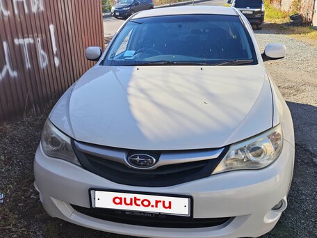 2010 Subaru Impreza III, белый, 585000 рублей, вид 2
