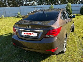 2014 Hyundai Solaris I Рестайлинг, коричневый, 999000 рублей, вид 2