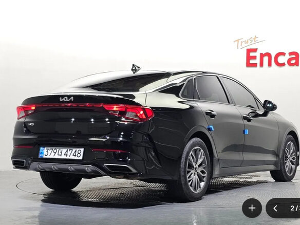 2023 Kia K5 III, чёрный, 1820000 рублей - вид 1