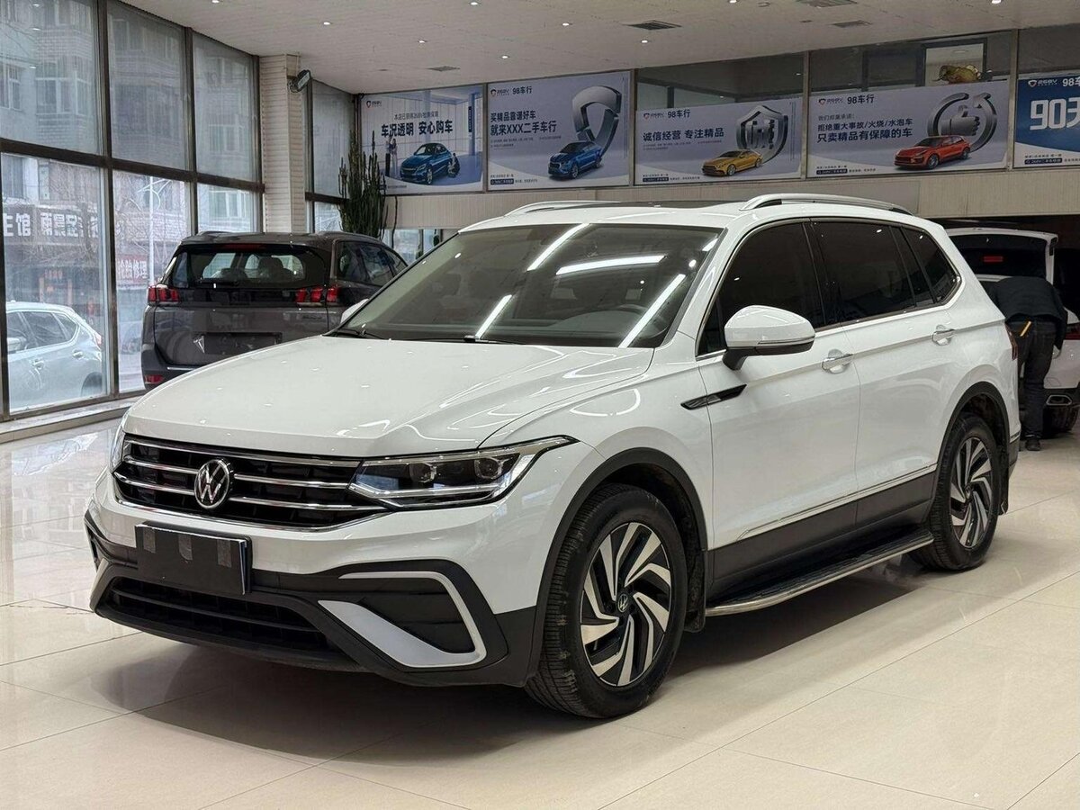 Открыть фотографии: Volkswagen Tiguan II Рестайлинг