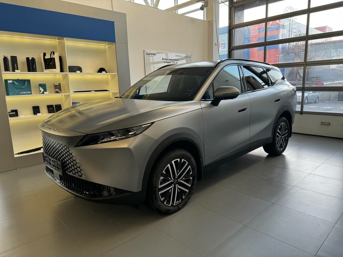 Открыть фотографии: Omoda C7