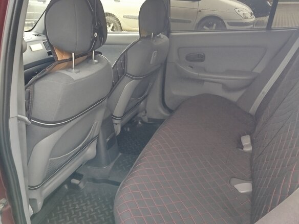 2010 Hyundai Elantra ТагАЗ III (XD2) Рестайлинг, красный - вид 12