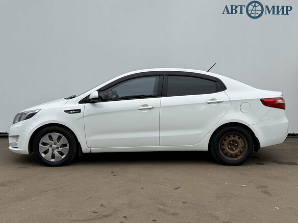 2014 Kia Rio 6-speed III, белый, 750000 рублей - вид 7