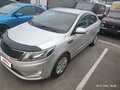 2014 Kia Rio 4-speed III, серебристый, 915000 рублей - вид 1
