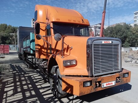 2005 Freightliner FLD, золотистый, 850000 рублей, вид 3