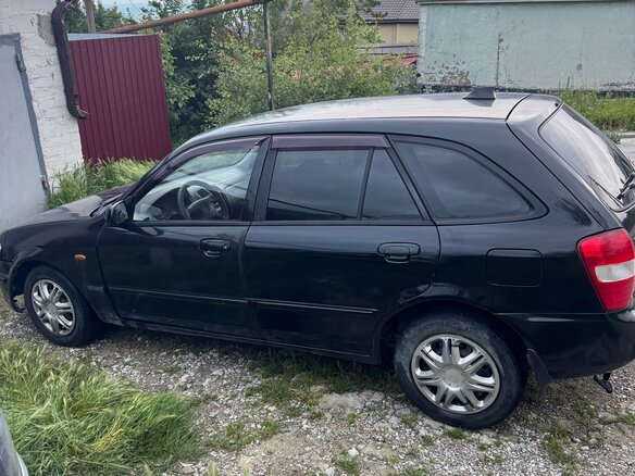 1999 Mazda 323 VI (BJ), чёрный, 260000 рублей - вид 2