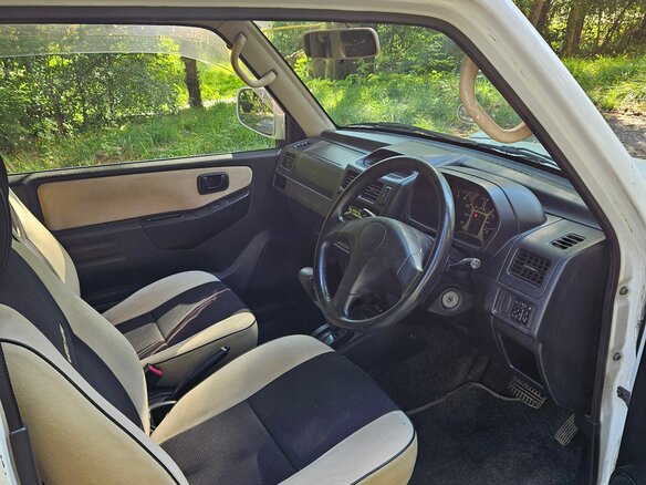 2000 Mitsubishi Pajero Mini II, белый - вид 5
