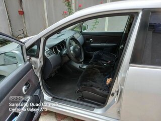 2012 Nissan Tiida I Рестайлинг, серебристый, 950000 рублей, вид 4