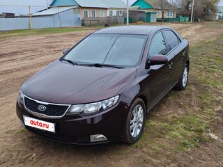 2010 Kia Cerato 6-speed II, пурпурный, 850000 рублей, вид 1