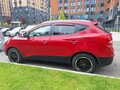 2013 Hyundai ix35 I, красный - вид 4