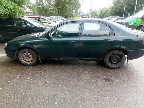 2000 Kia Shuma I, зелёный, 100000 рублей - вид 3